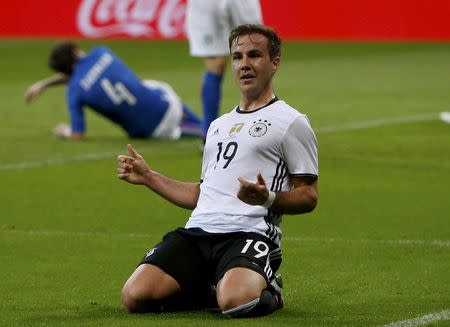 Football Soccer - Germany v Italy - International Friendly - Allianz-Arena, Munich, Germany - 29/3/16 Germany's Mario Goetze celebrates after scoring the second goal against Italy REUTERS/Michaela Rehle TPX IMAGES OF THE DAY