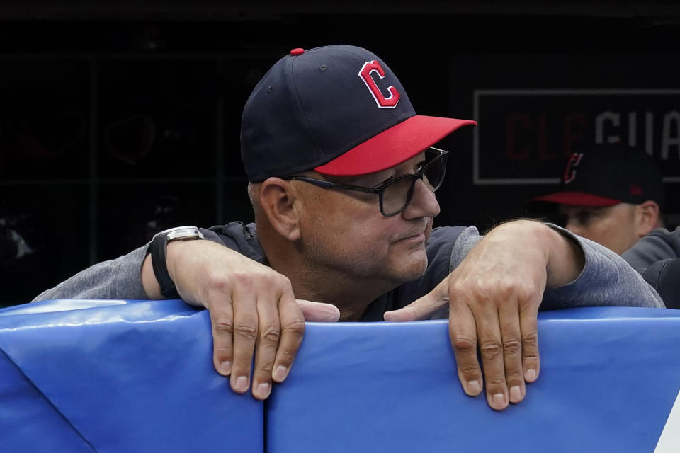 Cleveland Guardians manager Terry Francona stands in the dugout following a tribute video before the team's baseball game against the Cincinnati Reds, Wednesday, Sept. 27, 2023, in Cleveland. Although he hasn't officially announced his retirement, Francona is expected to do so formally early next week. (AP Photo/Sue Ogrocki)