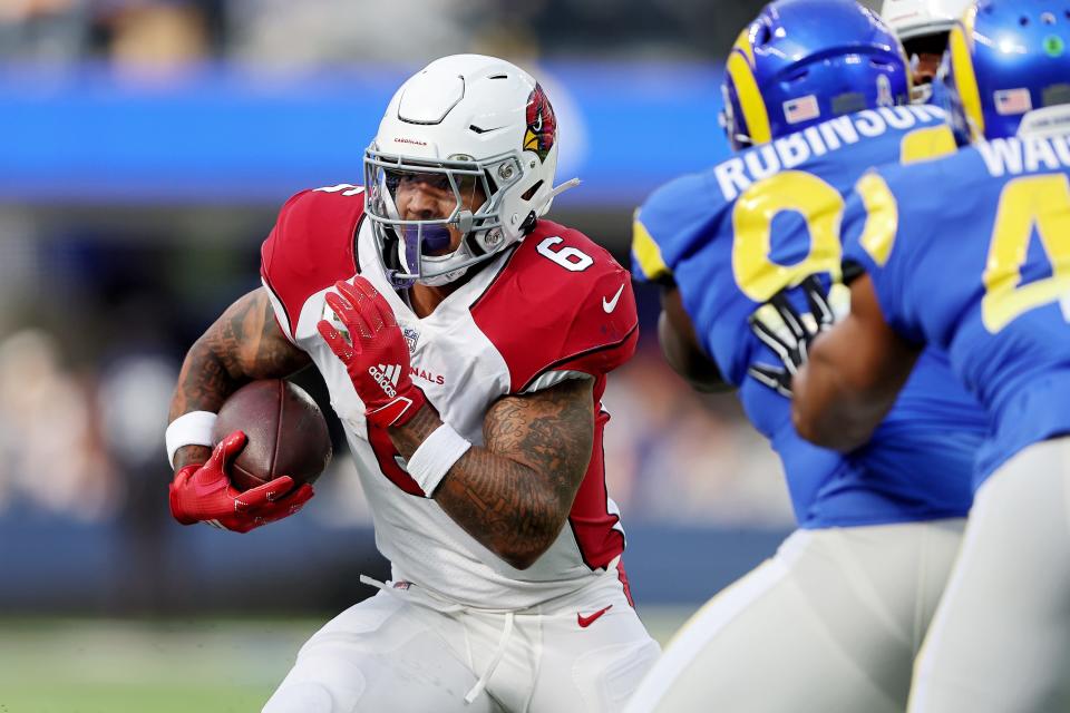 James Conner #6 of the Arizona Cardinals rushes the ball in the first quarter of the game against the Los Angeles Rams at SoFi Stadium on November 13, 2022, in Inglewood, California.