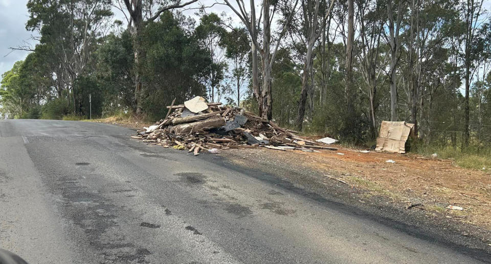 Pile of building material dumped on side of Flynn Avenue in Austral, Sydney's west.