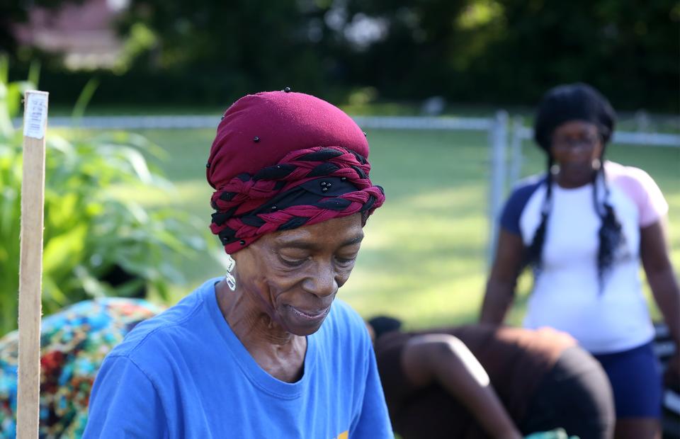 Evelyn Spurley works in this garden at Shawnee on Amy Ave. Students from 9 through 11-year-old are helping build this community garden. Communities being allowed to grow their own food can be important for combating food deserts.July 14, 2023