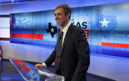 U.S. Rep. Beto O'Rourke poses for pictures after a debate with U.S. Senator Ted Cruz (not shown) at the KENS-5 Studios in San Antonio, Texas, U.S., October 16, 2018. Picture taken on October 16, 2018. Tom Reel/San Antonio Express-News/Pool via REUTERS