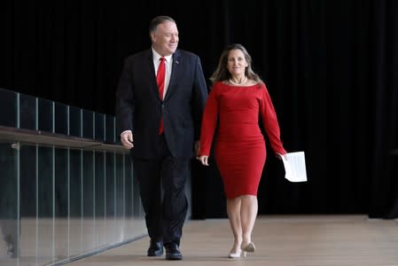 U.S. Secretary of State Pompeo and Canada's Foreign Minister Freeland walk to a news conference in Ottawa