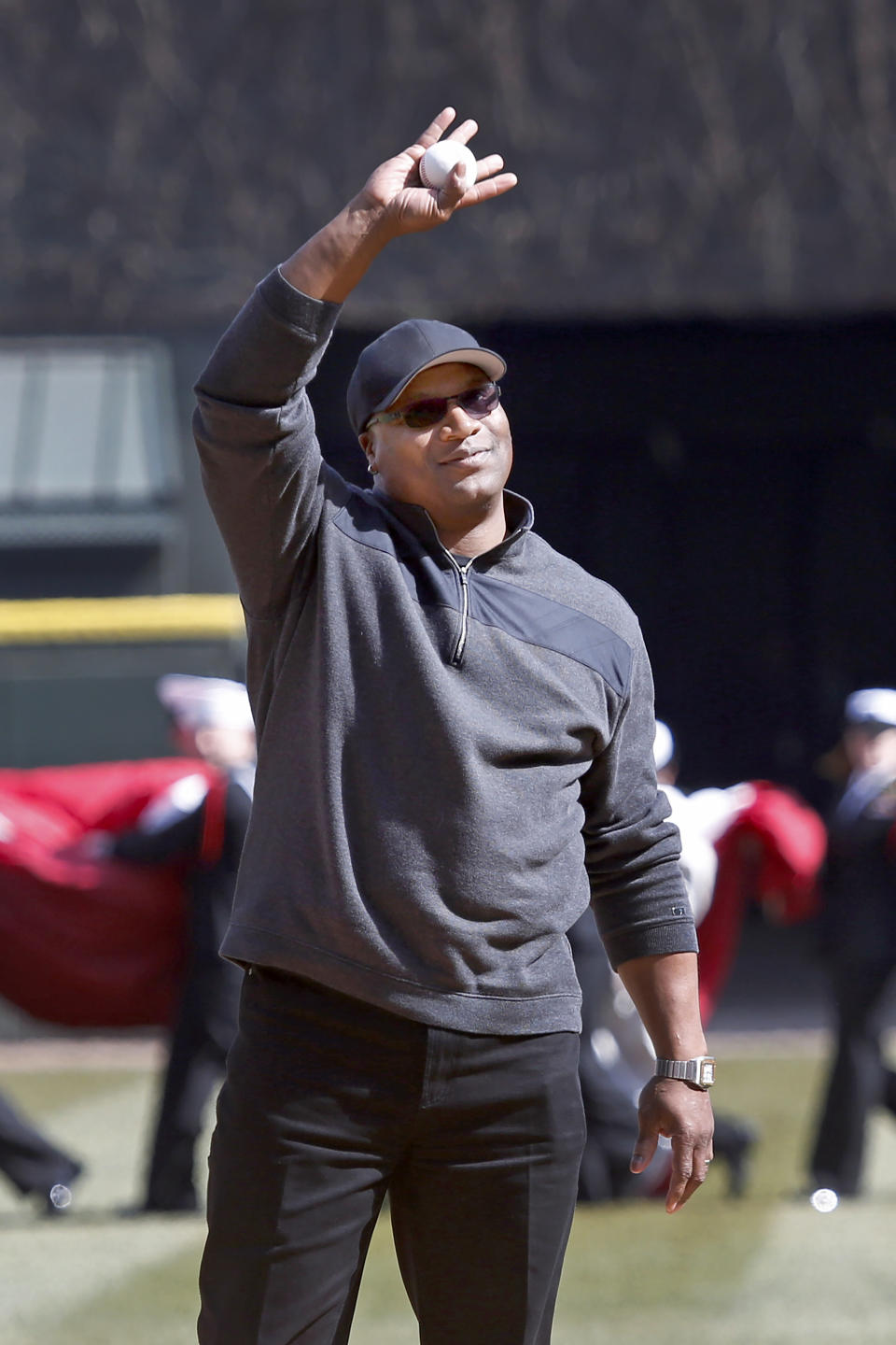 FILE - Former Chicago White Sox great Bo Jackson waves to the crowd before throwing the ceremonial first pitch before the White Sox and Kansas City Royals season opening baseball game Monday, April 1, 2013, in Chicago. Jackson helped pay for the funerals of the 19 children and two teachers killed in the Uvalde, Texas, school massacre in May 2022. The donation was previously anonymous but Jackson told The Associated Press this week he felt compelled to support the victims' families after the loss of so many children. (AP Photo/Charles Rex Arbogast, File)