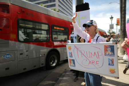 People protest against President Trump's proposed replacement for Obamacare in Los Angeles, California, U.S., March 14, 2017. REUTERS/Lucy Nicholson