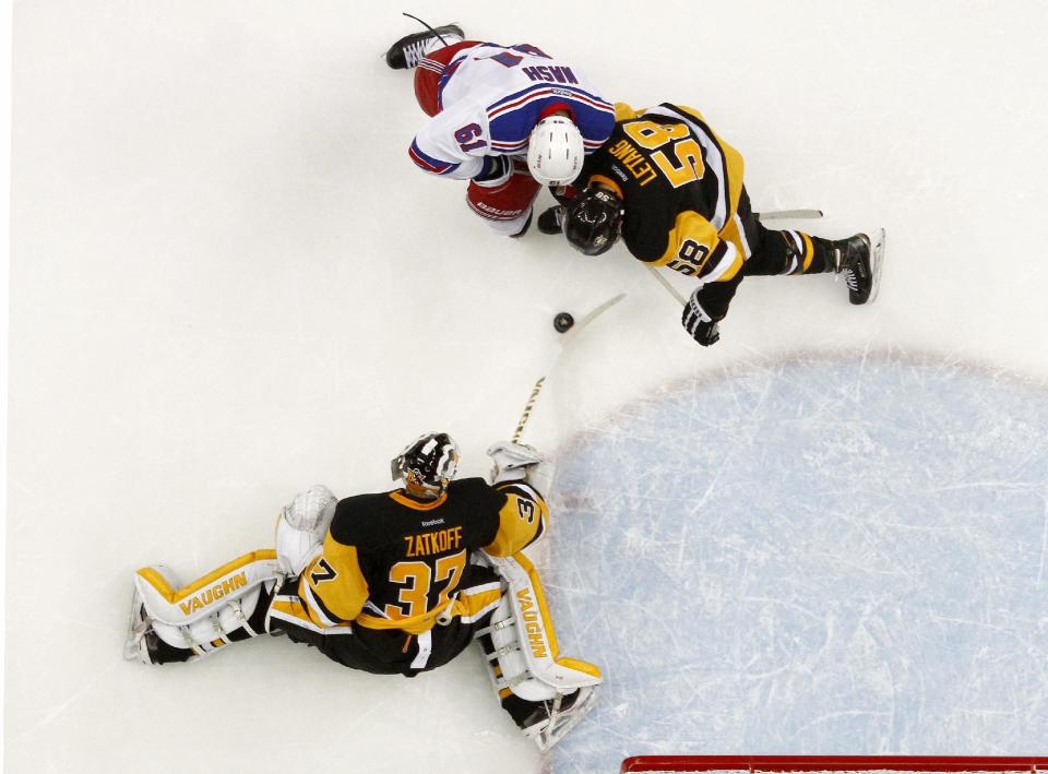 PITTSBURGH, PA - APRIL 13:  Jeff Zatkoff #37 of the Pittsburgh Penguins makes a save on Rick Nash #61 of the New York Rangers in Game One of the Eastern Conference Quarterfinals during the 2016 NHL Stanley Cup Playoffs at Consol Energy Center on April 13, 2016 in Pittsburgh, Pennsylvania.  (Photo by Justin K. Aller/Getty Images)