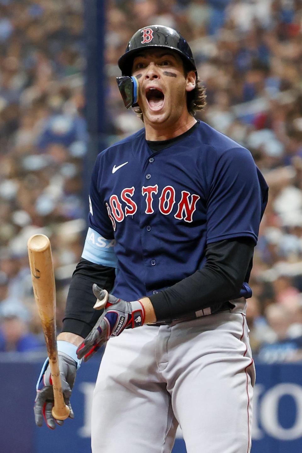 Boston Red Sox's Triston Casas reacts after a pitch that allowed him to walk in the fourth inning of a baseball game against the Tampa Bay Rays in St. Petersburg, Fla., Thursday, April 13, 2023. (Ivy Ceballo/Tampa Bay Times via AP)