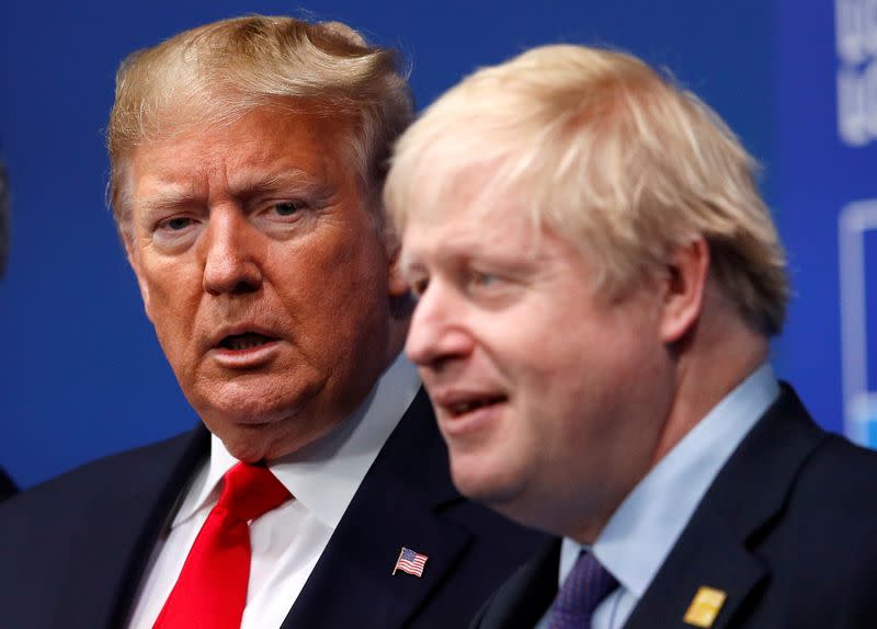 FILE PHOTO: Britain's Prime Minister Boris Johnson welcomes U.S. President Donald Trump at the NATO leaders summit in Watford