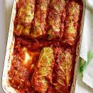 <p>Though traditional stuffed cabbage recipes are made with meat, here Savoy cabbage leaves are stuffed with a combination of rice, mushrooms, onions, garlic and herbs for a healthy vegetarian stuffed cabbage recipe. The stuffed cabbage leaves gently bake in a simple tomato sauce. This easy stuffed cabbage recipe can be made ahead of time and baked just before serving. <a href="https://www.eatingwell.com/recipe/252621/vegetarian-stuffed-cabbage/" rel="nofollow noopener" target="_blank" data-ylk="slk:View Recipe" class="link ">View Recipe</a></p>