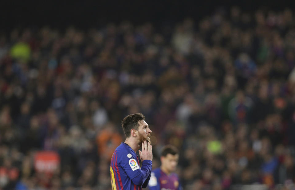 FC Barcelona's Lionel Messi pauses during the Spanish La Liga soccer match between FC Barcelona and Valladolid at the Camp Nou stadium in Barcelona, Spain, Saturday, Feb. 16, 2019. (AP Photo/Manu Fernandez)