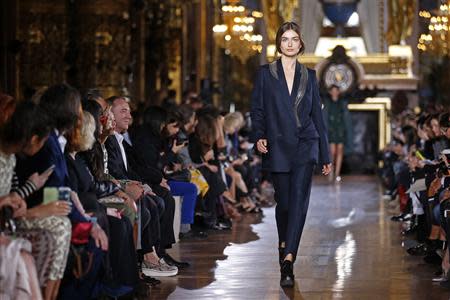 A model presents a creation by British designer Stella McCartney as part of her Fall/Winter 2014-2015 women's ready-to-wear collection show during Paris Fashion Week March 3, 2014. REUTERS/Benoit Tessier