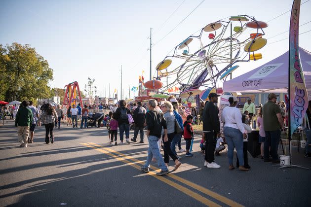 Crowds of people enjoy the carnival. (Photo: Damon Dahlen/HuffPost)