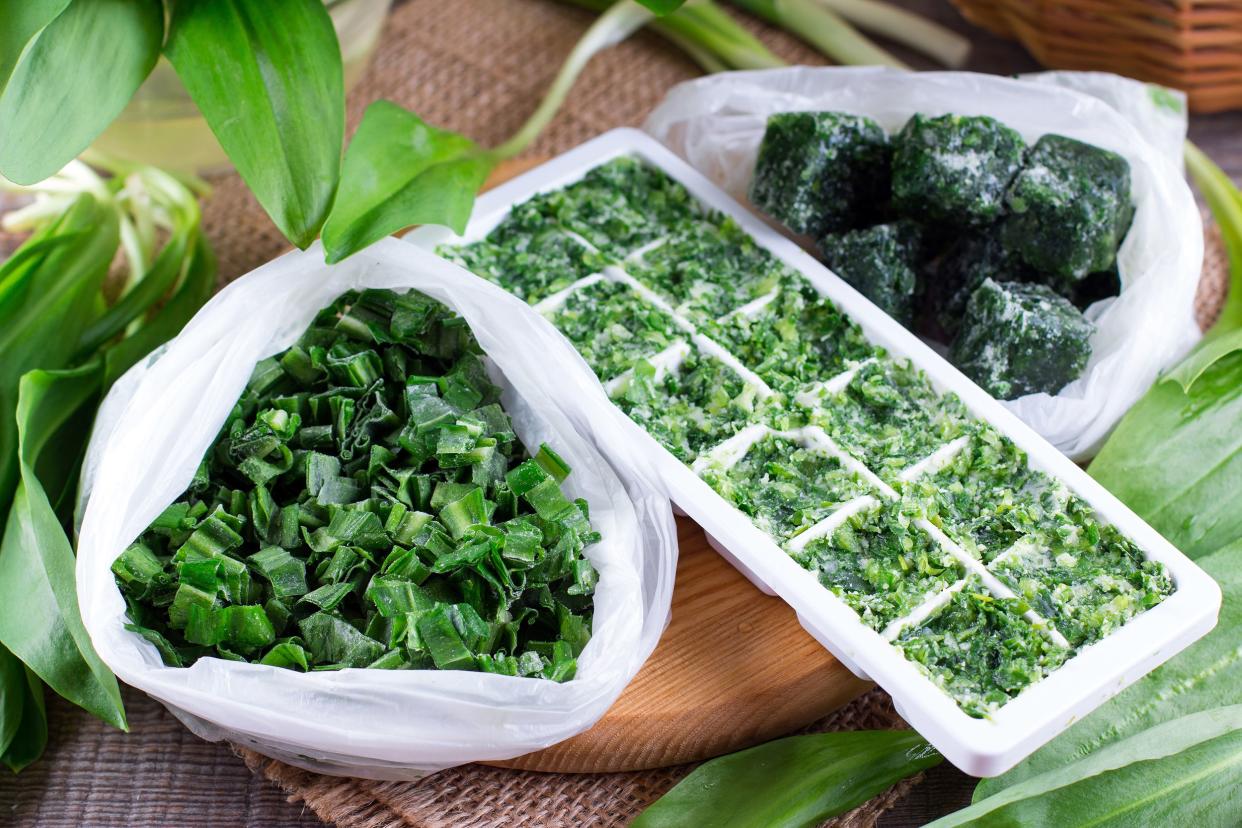 Ice cube tray with frozen herbs