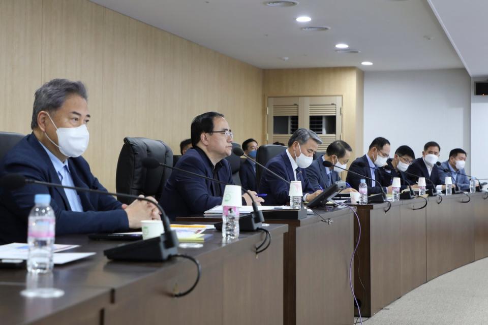 In this photo provided by South Korean Presidential Office, South Korean National Security Director Kim Sung-han, second from left, and Foreign Minister Park Jin, left, attend a National Security Council (NSC) meeting in Seoul, South Korea on 9 October (AP)