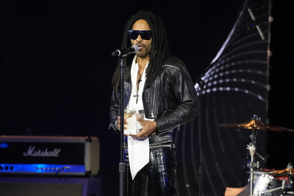 Four-time Grammy-winning artist Lenny Kravitz receives the Recording Academy Global Impact Award at the third annual Recording Academy Honors Presented by The Black Music Collective in Los Angeles on Thursday, Feb. 1, 2024. (AP Photo/Damian Dovarganes)