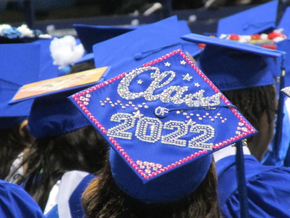 Graduates from the Class of 2022 wait to receive their diplomas during commencement ceremonies Saturday, May 7, 2022, at Crown Coliseum.