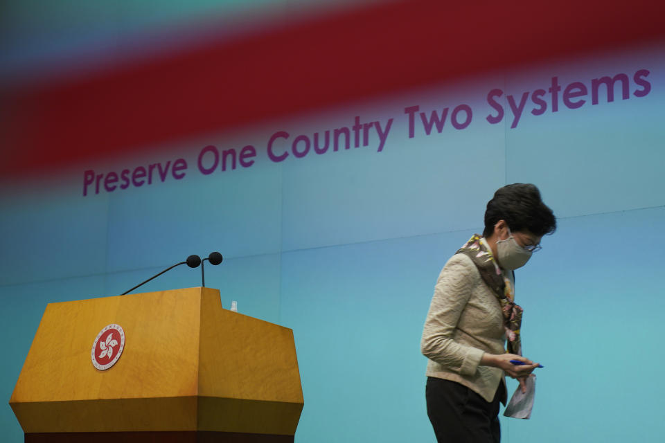 Hong Kong Chief Executive Carrie Lam leaves after a press conference in Hong Kong, Tuesday, June 2, 2020. Lam hit out at the "double standards" of foreign governments over national security, and pointed to recent unrest in America as an example. (AP Photo/Vincent Yu)