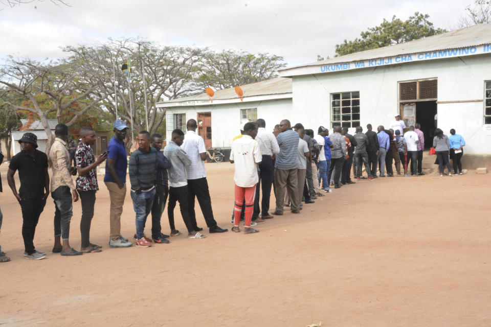 Residents lineup to cast their vote Wednesday, Oct. 28, 2020, in Dodoma, Tanzania, for a presidential election that the opposition warns is already deeply compromised by manipulation and deadly violence. (AP Photo)