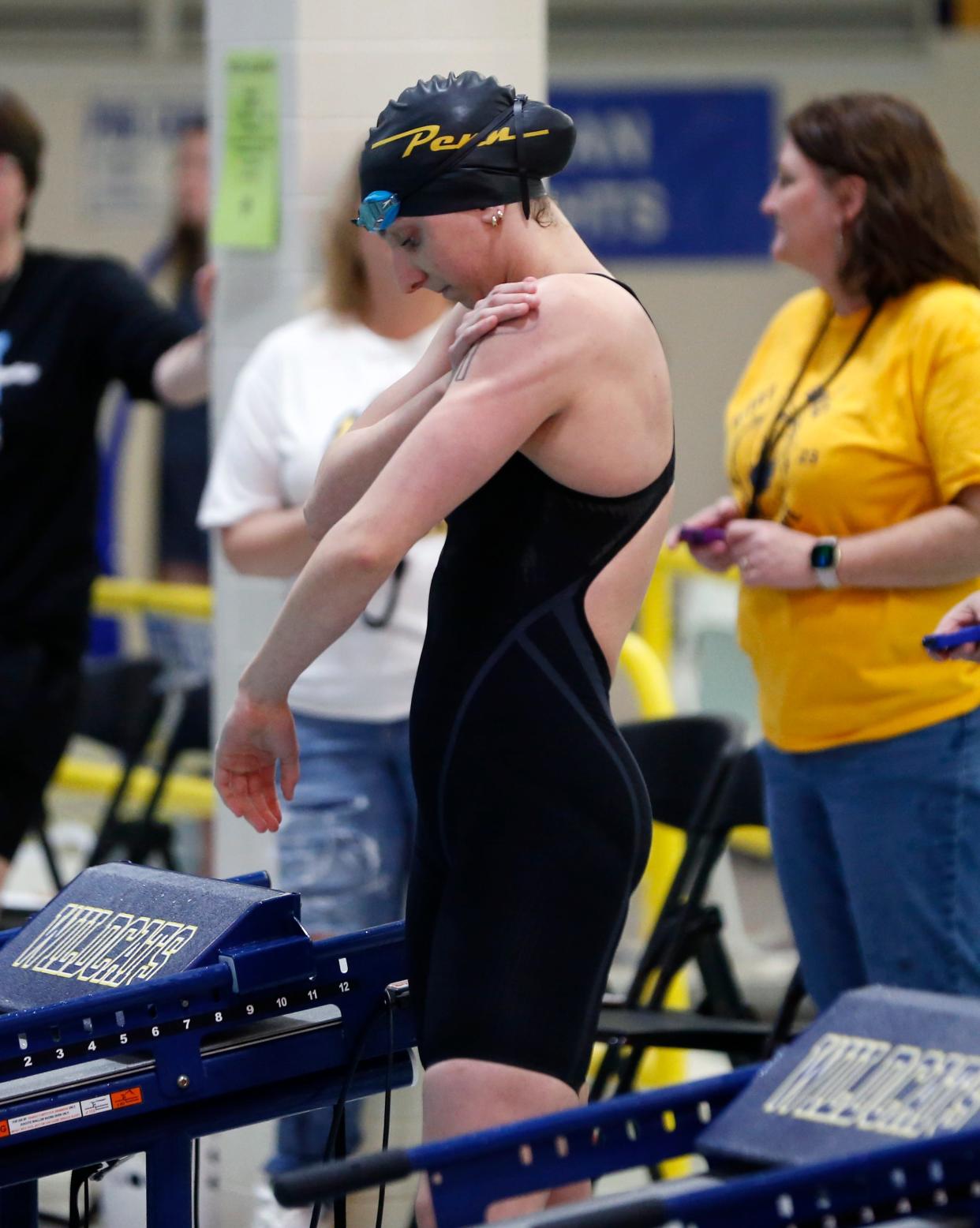 Penn senior Lily Christianson prepares to compete in the 50-yard freestyle race at the girls swimming sectional Saturday, Feb. 3, 2024, at Riley High School in South Bend.