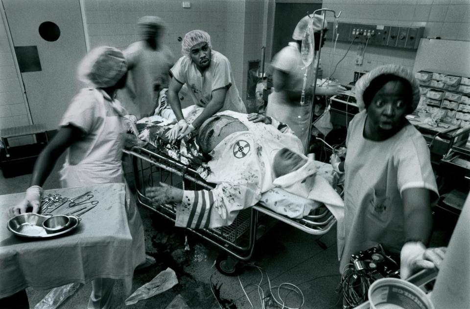 This staged photo, depicting an all-Black team of medics helping a Klansman. ran as an ad in Australia-based Large Magazine, which is no longer in print.