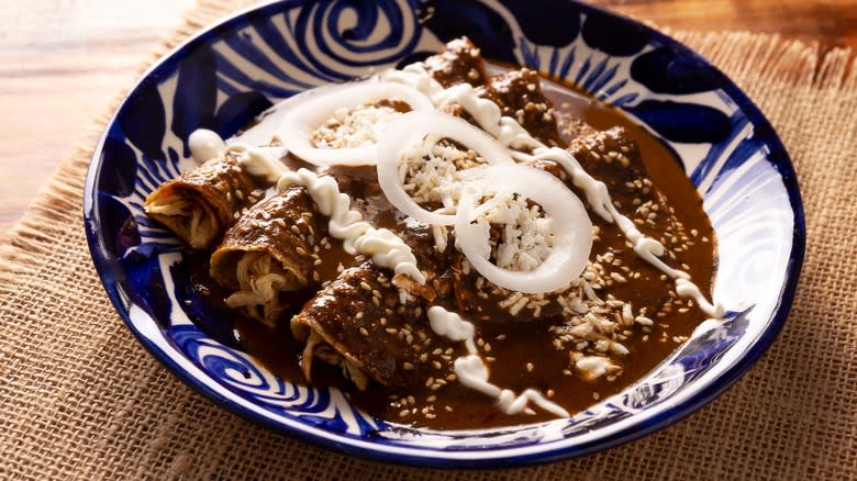 enchiladas served with mole