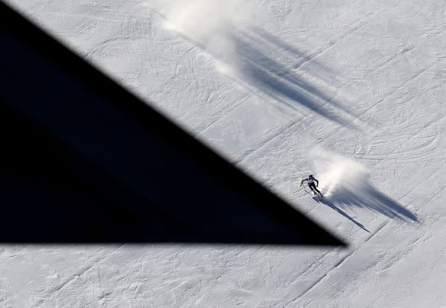 A competitor takes her practice run for the giant slalom event on the eve of the Women's FIS Ski Alpine World Cup in Soelden, Austria, on Oct. 22. (Photo: JOE KLAMAR/AFP via Getty Images)