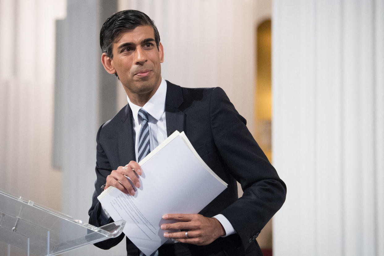 Britain's Chancellor of the Exchequer Rishi Sunak walks after delivering his 'Mansion House' speech at the Financial and Professional Services Address, previously known as the Bankers dinner, at Mansion House in the City of London on July 1, 2021. (Photo by Stefan Rousseau / POOL / AFP) (Photo by STEFAN ROUSSEAU/POOL/AFP via Getty Images)