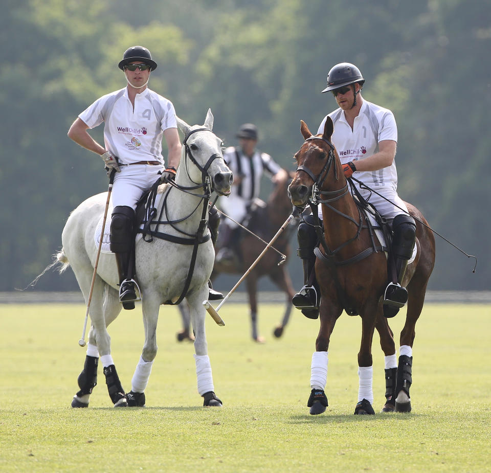 Prince William the Duke of Cambridge and Prince Harry attend day two of the Audi Polo Challenge at Coworth Park on May 29, 2016 in London, England.