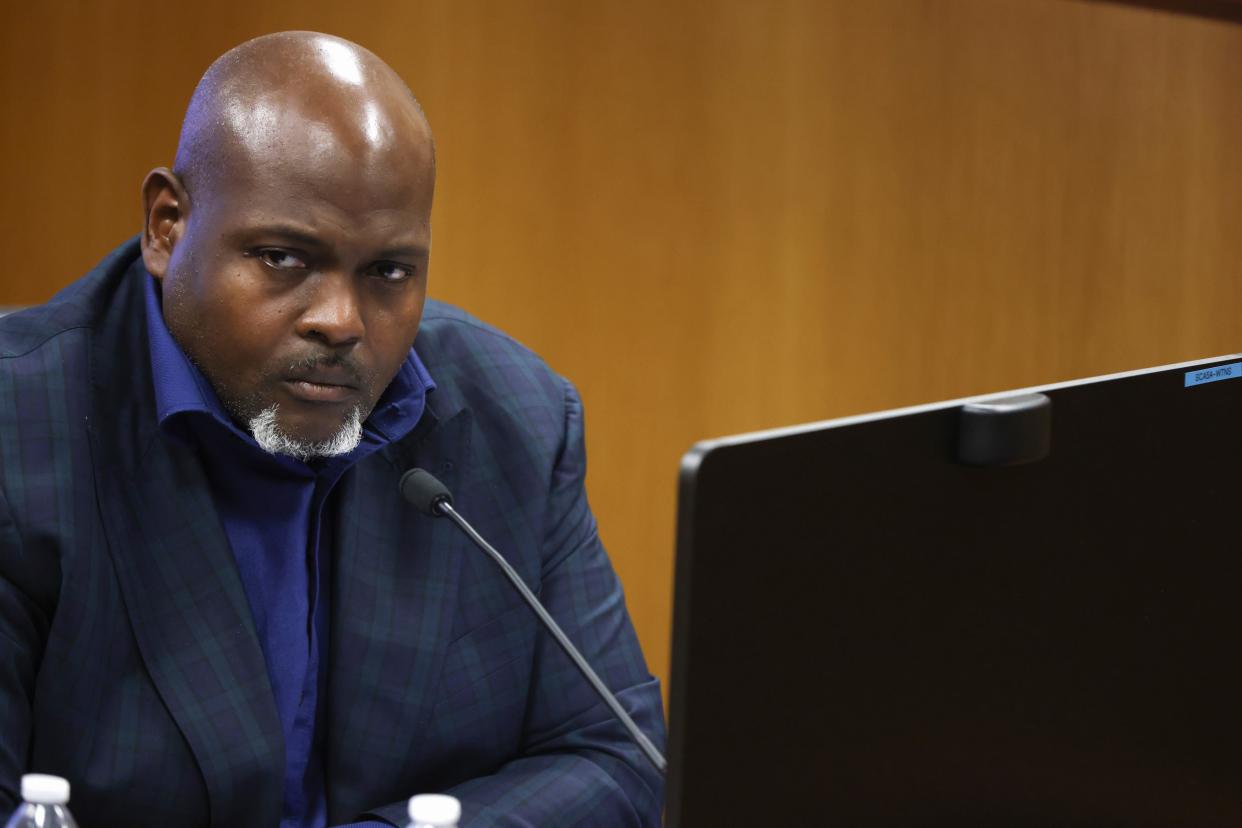 ATLANTA, GA - FEBRUARY 16: Witness Terrence Bradley looks on from the witness stand during a hearing in the case of the State of Georgia v. Donald John Trump at the Fulton County Courthouse on February 16, 2024 in Atlanta, Georgia. Judge Scott McAfee is hearing testimony as to whether DA Fani Willis and Special Prosecutor Nathan Wade should be disqualified from the case for allegedly lying about a personal relationship. (Photo by Alyssa Pointer-Pool/Getty Images)