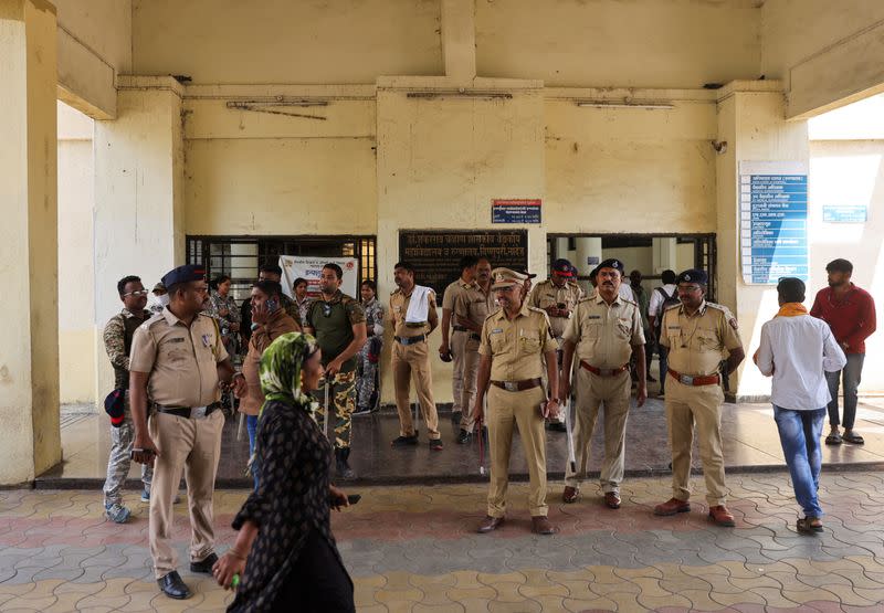 Policemen stand guard inside the Shankarrao Chavan Government Medical College and Hospital in Nanded