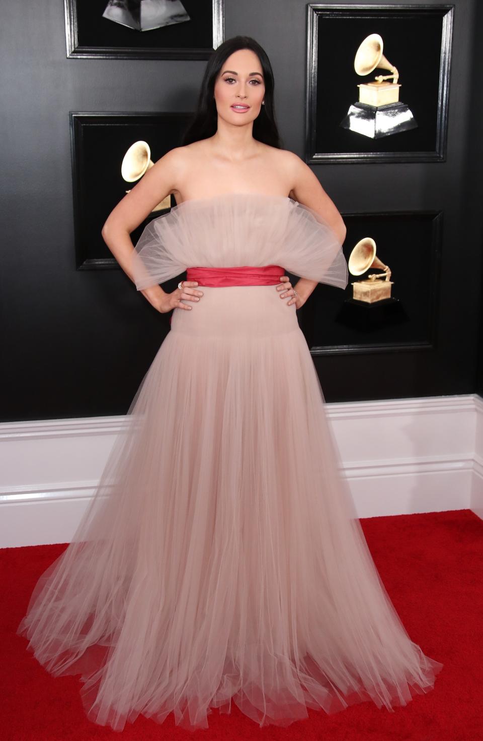 Kacey at the Grammys 2019 in fan-like Valentino.