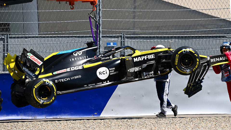 The car of Daniel Ricciardo, pictured here being removed from the circuit.