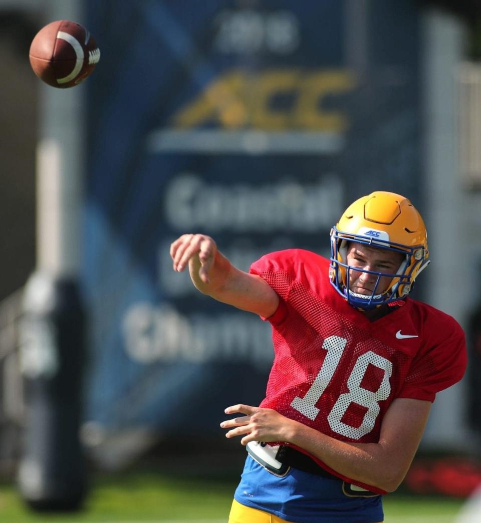 Pitt Panthers quarterback Eli Kosanovich throws a pass during a practice at the UPMC Rooney Sports Complex on the South Side.