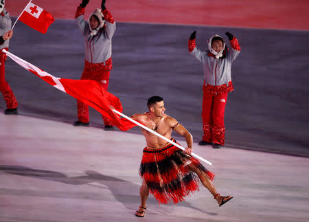 FILE PHOTO - Pyeongchang 2018 Winter Olympics – Opening Ceremony – Pyeongchang Olympic Stadium- Pyeongchang, South Korea – February 9, 2018 - Pita Taufatofua of Tonga carries the national flag during the opening ceremony. REUTERS/Phil Noble