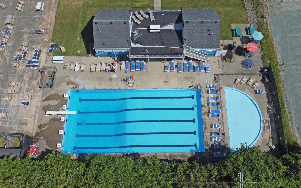 Members old and new will see some improvements at Woodland Pool, seen in a drone photo. The pool and other parts of the club have been repainted, and concrete has been repaired.