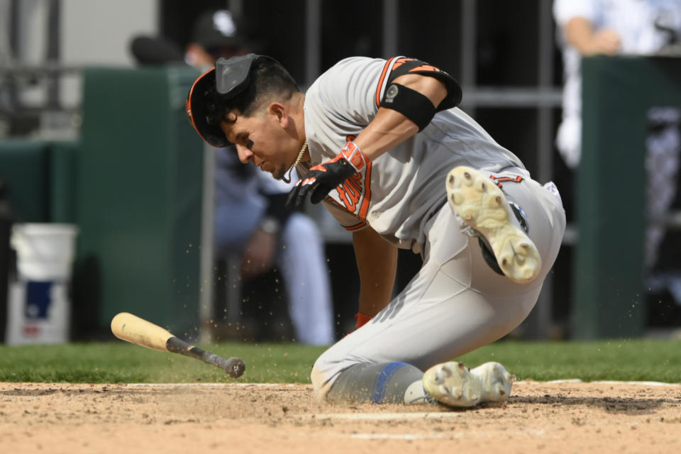Baltimore Orioles' Ramon Urias reacts after getting hit in the head by a pitch during the seventh inning of a baseball game against the Chicago White Sox, Saturday, April 15, 2023, in Chicago. Chicago won 7-6 in 10 innings.(AP Photo/Paul Beaty)