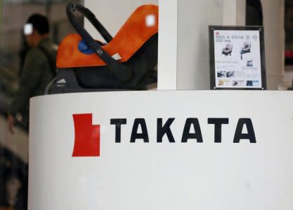 FILE PHOTO: The logo of Takata Corp is seen on its display at a showroom for vehicles in Tokyo, Japan, February 9, 2017.  REUTERS/Toru Hanai/File Photo