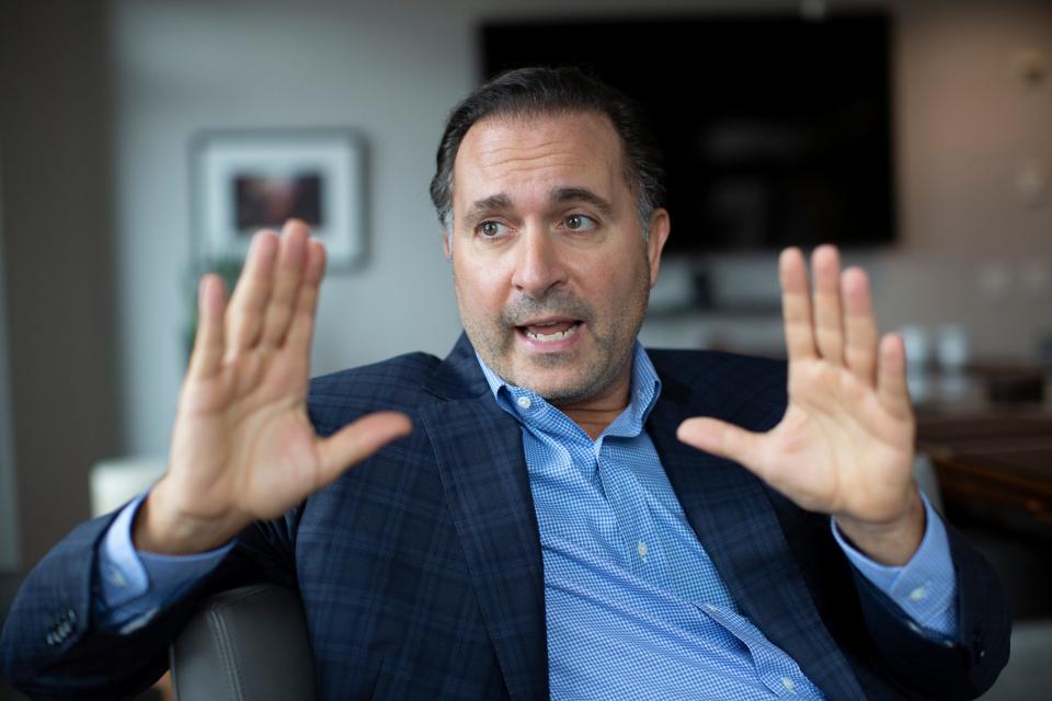 Portrait of RedBird Capital Partners' Gerry Cardinale with his hands in the air