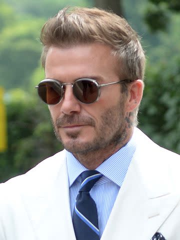 Neil Mockford/GC Images David Beckham attends the Wimbledon Championships on July 09, 2021, in London, England.