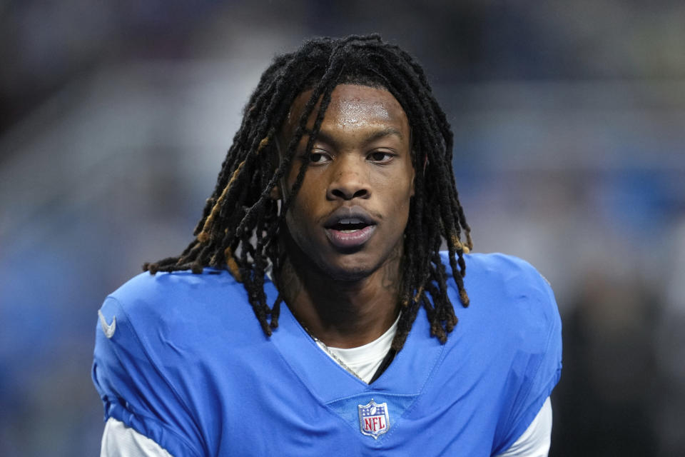 FILE - Detroit Lions wide receiver Jameson Williams watches during an NFL football game against the Chicago Bears in Detroit, Sunday, Jan. 1, 2023. The NFL has suspended five players for violating the league&#x002019;s gambling policy on Friday, April 21, 2023. Detroit Lions wide receiver Quintez Cephus and safety C.J. Moore and Washington Commanders defensive end Shaka Toney were suspended indefinitely, while Lions wide receivers Stanley Berryhill and Jameson Williams have been suspended six games.(AP Photo/Paul Sancya, File)