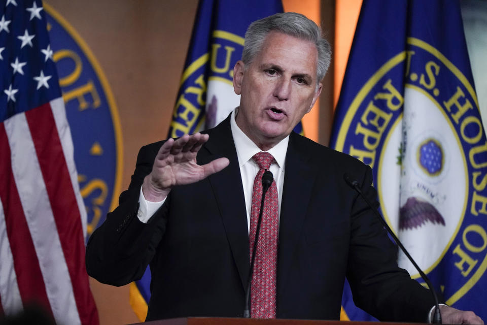 FILE - House Minority Leader Kevin McCarthy, R-Calif., responds to reporters at the Capitol in Washington, Friday, Dec. 3, 2021. House Republican leader Kevin McCarthy told other GOP lawmakers shortly after the Jan. 6, 2021, Capitol insurrection that he would urge then-President Donald Trump to resign, according to an audio recording posted Thursday night, April 21, 2022 by The New York Times. (AP Photo/J. Scott Applewhite, File)