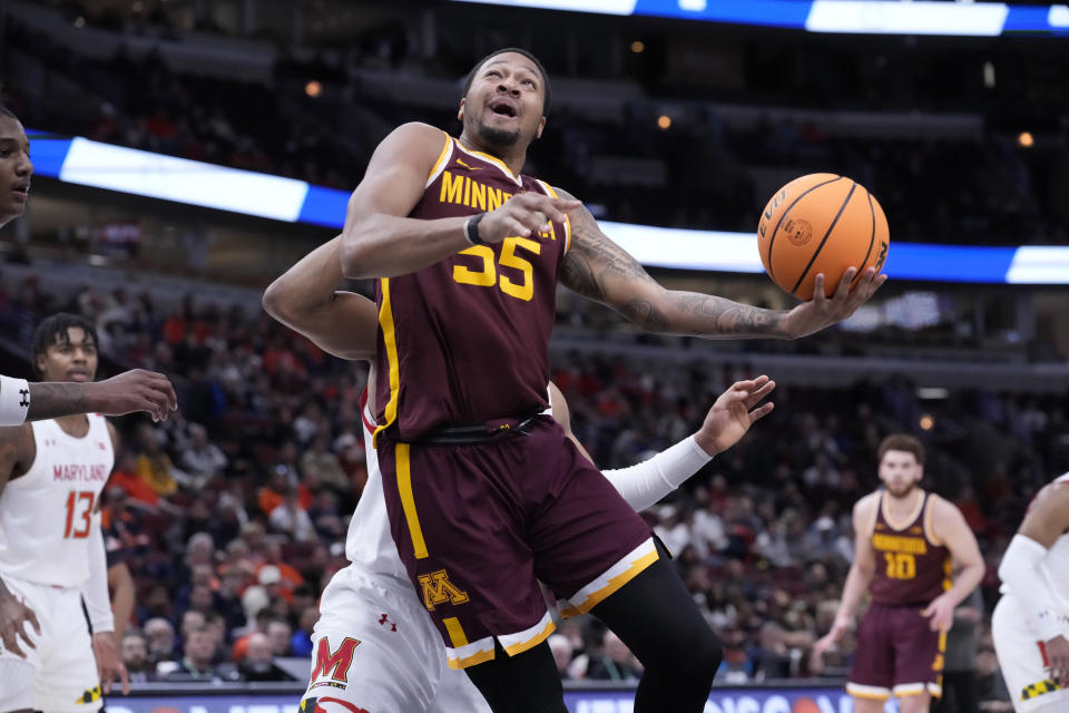 Minnesota's Ta'lon Cooper drives to the basket during the first half of an NCAA college basketball game against Maryland at the Big Ten men's tournament, Thursday, March 9, 2023, in Chicago. (AP Photo/Charles Rex Arbogast)