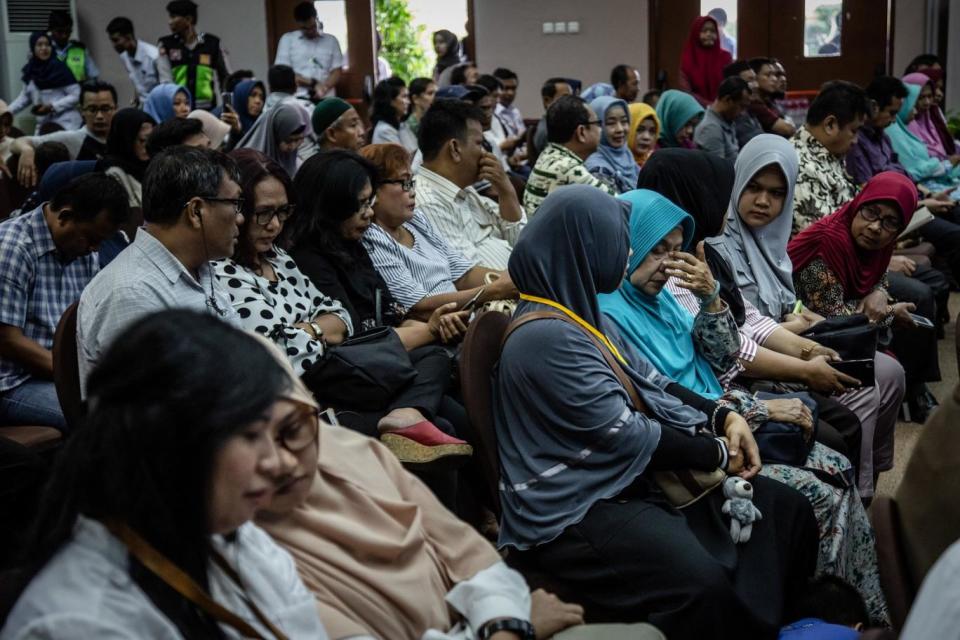 Families of victims of Lion Air flight JT 610 attend a meeting on Monday (Getty Images)