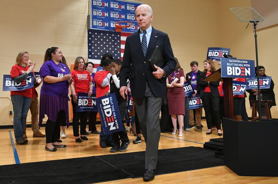 Democratic presidential candidate Joe Biden walks off the stage after speaking during a campaign stop at Driving Park Community Center in Columbus, Ohio, on Tuesday. Biden announced a new campaign manager on Thursday. (Photo: MANDEL NGAN via Getty Images)