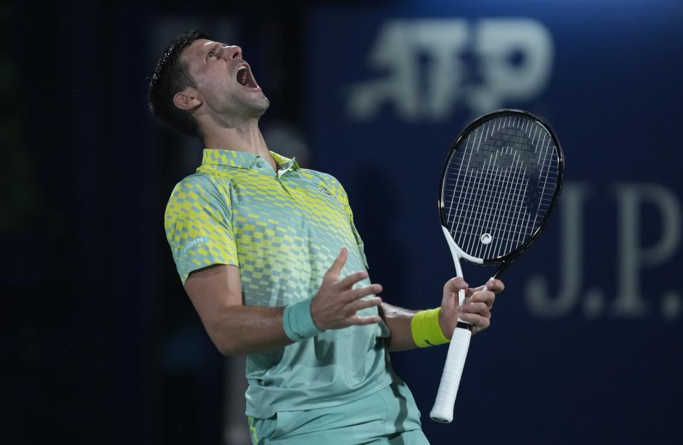 Serbia's Novak Djokovic reacts after he lost a point against Daniil Medvedev during their semi final match of the Dubai Duty Free Tennis Championships in Dubai, United Arab Emirates, Friday, March 2, 2023. (AP Photo/Kamran Jebreili)