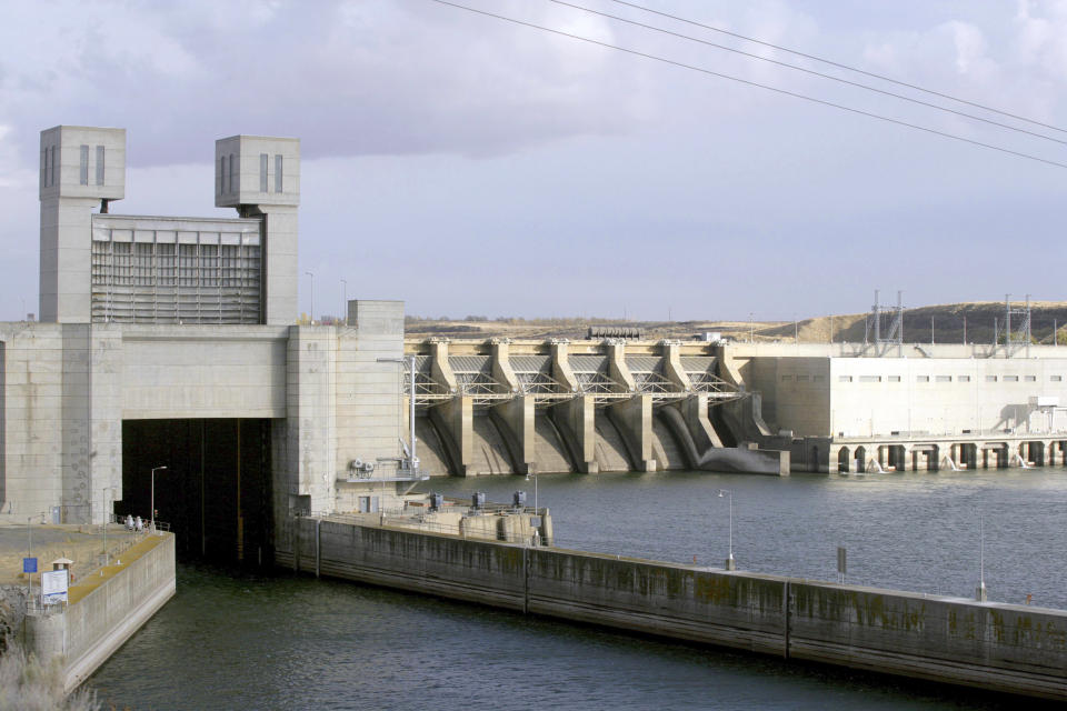 FILE - This photo shows the Ice Harbor dam on the Snake River in Pasco, Wash, Oct. 24, 2006. In a move that conservationists and tribes called a potential breakthrough, President Joe Biden has directed federal agencies to use all available authorities and resources to restore “healthy and abundant” salmon runs in the Columbia River Basin. (AP Photo/Jackie Johnston, File)