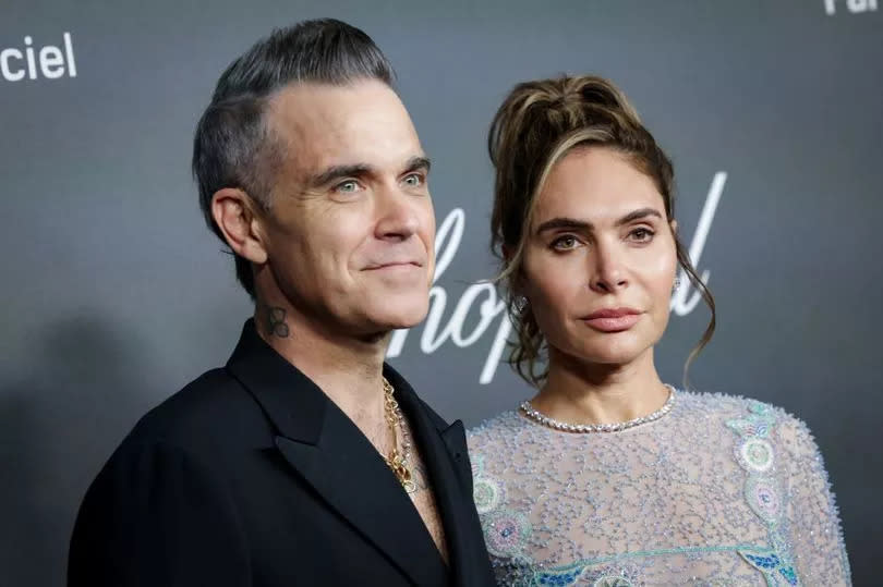 Robbie Williams with his wife Ayda -Credit:Getty Images