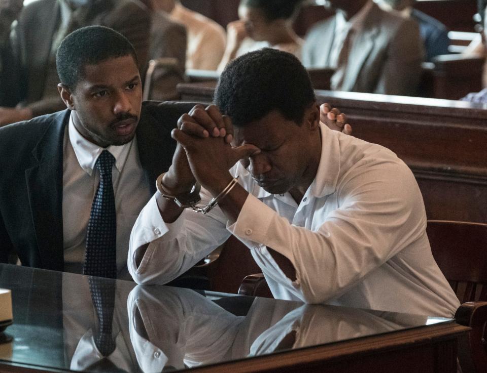 Bryan Stevenson (Michael B. Jordan, left) works to free wrongly imprisoned Walter McMillian (Jamie Foxx) in 