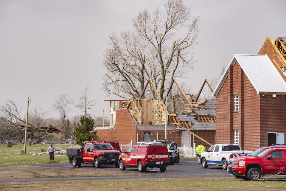 This Thursday, March 14, 2019 photo shows damage to Mount Zion Church in West Paducah, Ky. The twister left a path in western Kentucky from Lovelaceville through the West Paducah area, according to Keith Todd, a spokesman for the Kentucky Transportation Cabinet. He said the public was being asked to avoid the area while utility crews, area fire departments, and rescue squads worked to clear utility lines, downed trees and other debris (Dave Thompson/The Paducah Sun via AP)