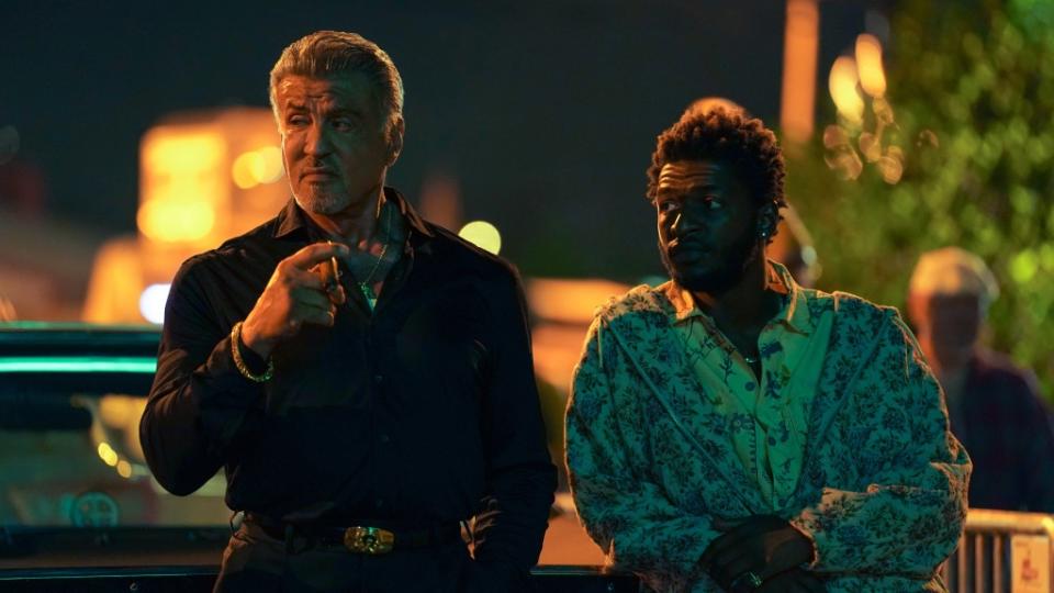 Sylvester Stallone as Dwight "The General" Manfredi and Jay Will as Tyson of the Paramount+ original series TULSA KING. Photo Cr: Brian Douglas/Paramount+. © 2022 Viacom International Inc. All Rights Reserved.